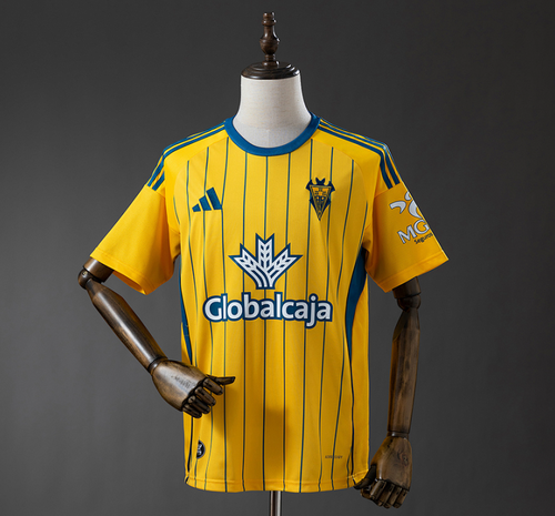 Yellow sports jersey with branding on a mannequin against a gray background, Albacete 25/26 Third Away Jersey, 11culture, 11 culture, original football jersey, original soccer jersey