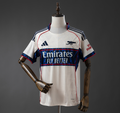White sports jersey with red and blue accents on a mannequin against a gray background, Arsenal 25/26 Pre-Match- Beige Jersey , 11culture, 11 culture