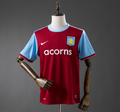 Red and blue sports jersey with visible branding on a mannequin against a gray background, Aston Villa 09/10 Home Retro Jersey , 11culture, 11 culture