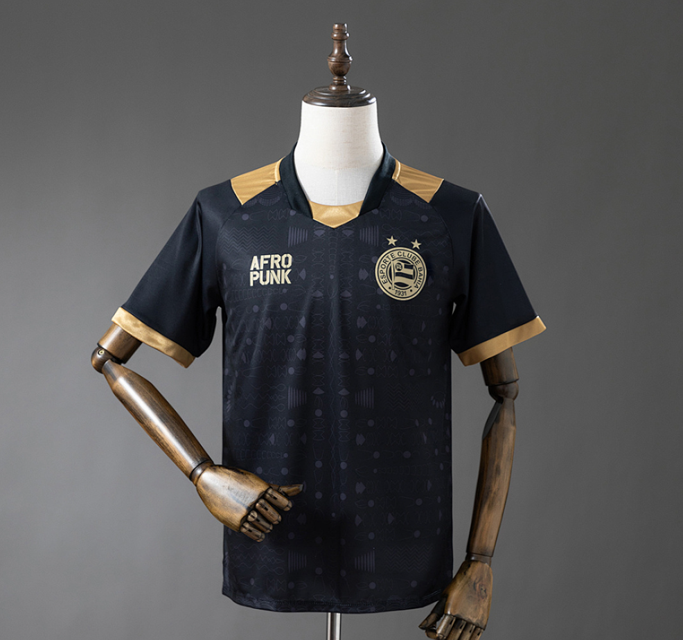 Black sports jersey with gold accents on a mannequin against a gray background, Bahia 25/26 Special Edition - Black Jersey , 11CULTURE, 11 CULTURE