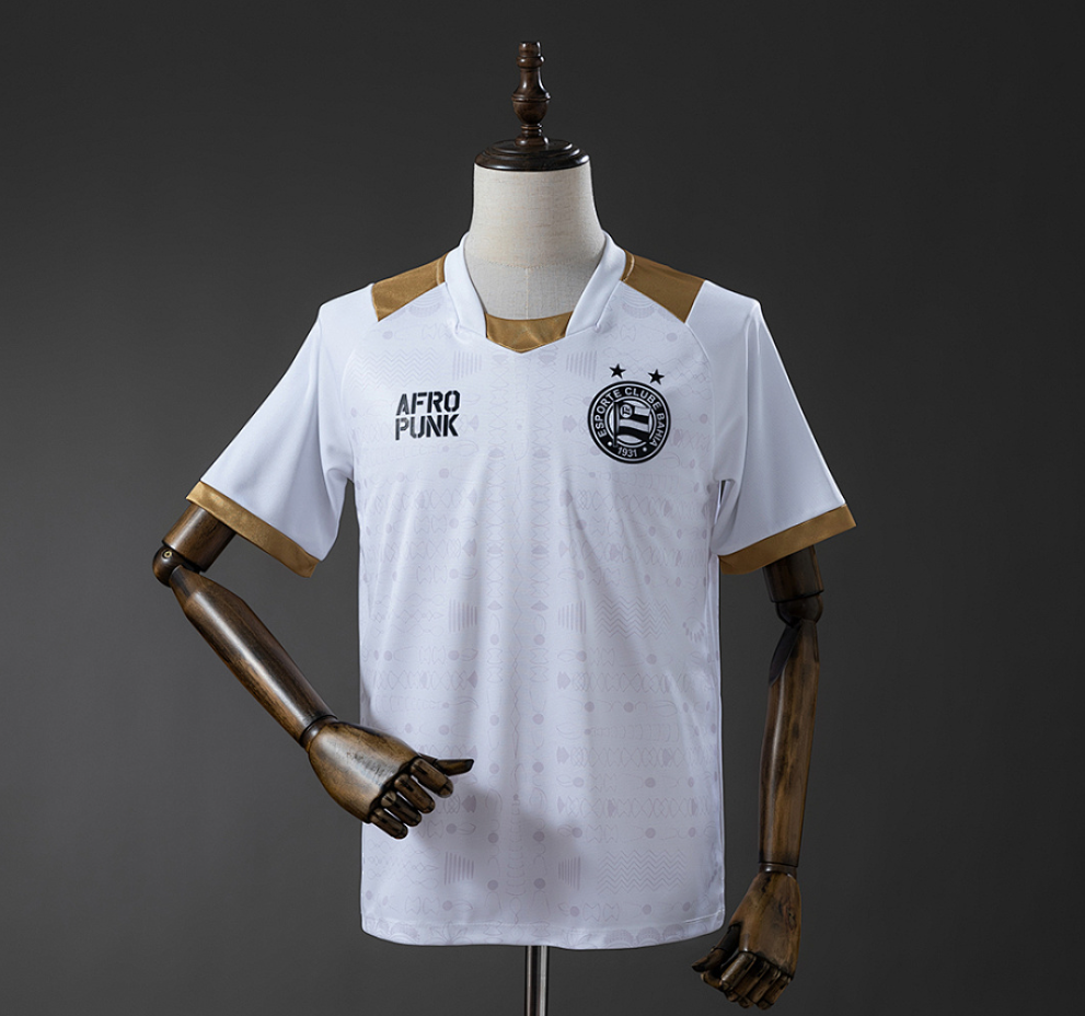 White polo shirt with 'Afropunk' branding on a mannequin against a dark background, Bahia 25/26 Special Edition - White Jersey, 11culture, 11 culture, original jerseys
