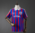 Blue and red striped sports jersey on a mannequin against a gray background, Crystal Palace 96/98 Home Retro Jersey, 11culture, 11 culture
