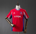Red sports jersey with Adidas and TDK logos on a mannequin against a gray background, Crystal Palace 98/99 Home Retro Jesery, 11culture, 11 culture, original jerseys