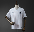 White sports jersey with Nike logo on a mannequin against a dark background