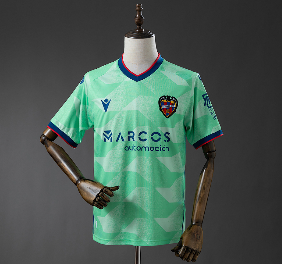 Green sports jersey on a mannequin with visible branding against a gray background, Levante UD 25/26 Third Away Jersey, 11culture, 11 culture, 7/11 culture, Levante football jersey