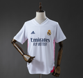White sports jersey with Adidas and Real Madrid logos on a mannequin against a dark background, Real Madrid 20/21 Home Jersey , 11 culture, 11culture, original jersey