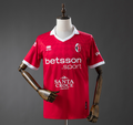 Red sports jersey with branding on a mannequin against a gray background, SPORTS JERSEY, 11 CULTURE, SSC Bari 25/26 Home Jersey , 11CULTURE, ORIGINAL JERSEYS, RETRO JERSEYS