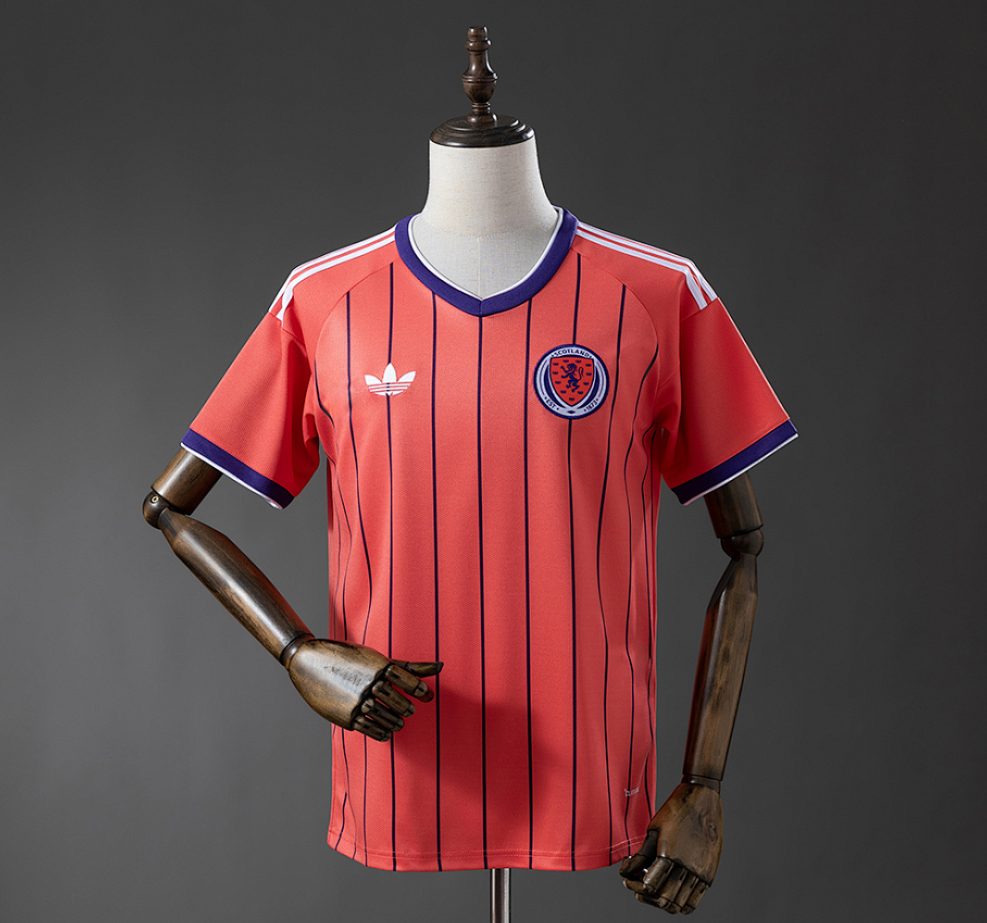 Red sports jersey with Adidas logo on a mannequin against a gray background, Scotland 2026 Away Jersey, 11culture, 11 culture, original jerseys, original football Jersey
