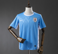 Blue sports jersey with a logo on a mannequin against a gray background, Uruguay 2025 Home Jesery , uruguay original jersey