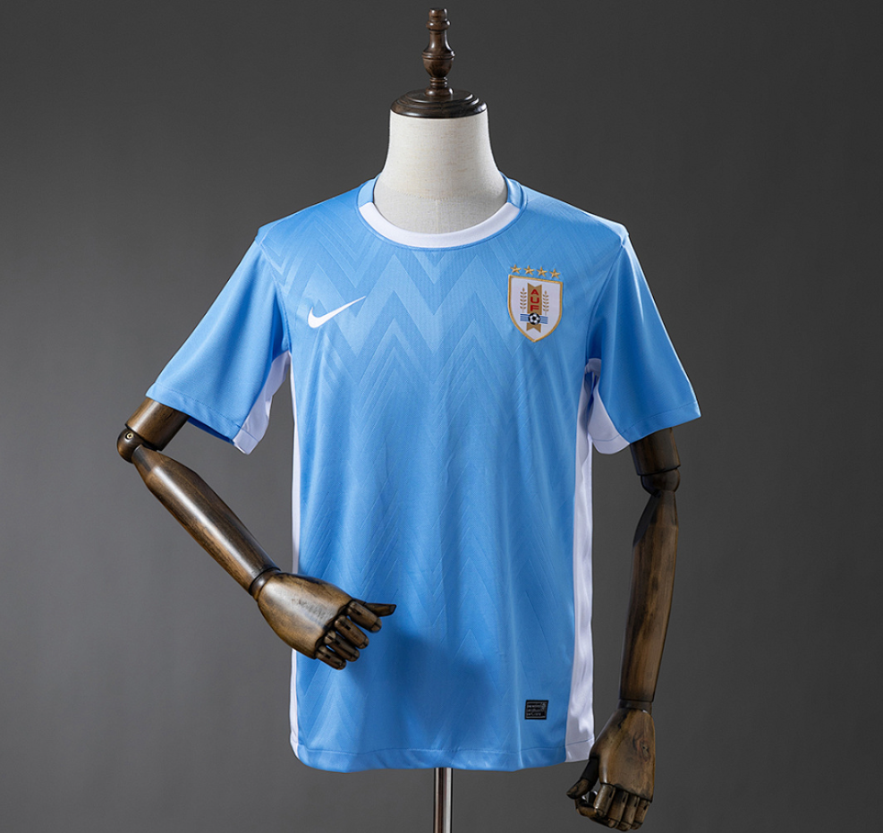 Blue sports jersey with a logo on a mannequin against a gray background, Uruguay 2025 Home Jesery , uruguay original jersey