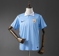 Light blue sports jersey with Nike logo on a mannequin against a gray background