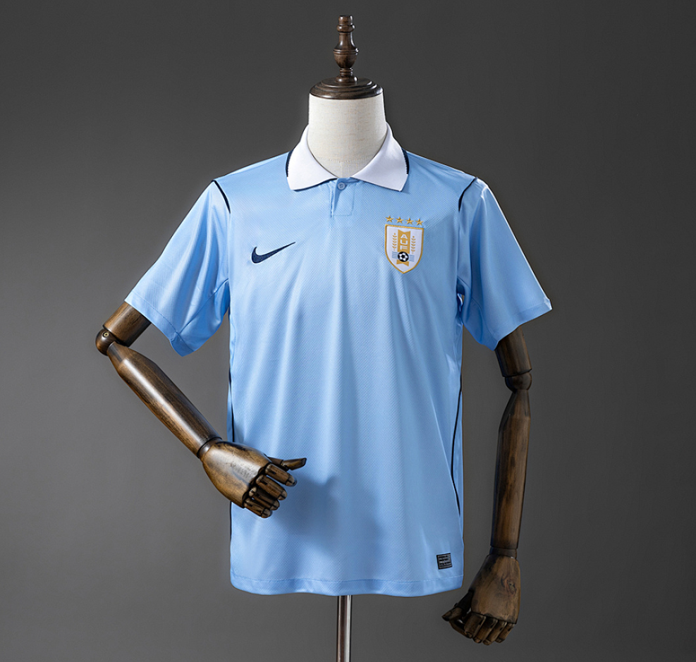 Light blue sports jersey with Nike logo on a mannequin against a gray background