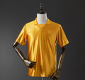 Yellow sports jersey on a mannequin with metallic arms against a dark background, Wolves 70th Anniversary Jersey , 11culture, 11 culture